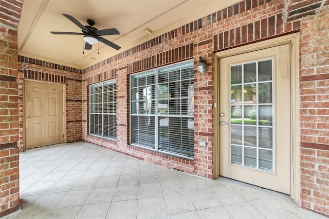2815 Kings Crossing Dr Unit 106, Houston, TX 77345 - view of patio featuring a ceiling fan