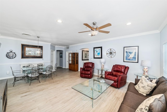 2815 Kings Crossing Dr Unit 106, Houston, TX 77345 - living area featuring arched walkways, baseboards, light wood finished floors, ceiling fan, and ornamental molding