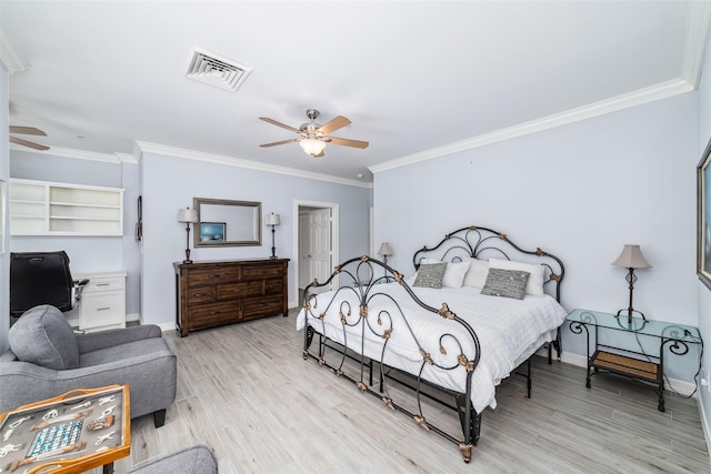2815 Kings Crossing Dr Unit 106, Houston, TX 77345 - bedroom featuring ornamental molding, light wood-style floors, baseboards, a ceiling fan, and an office area