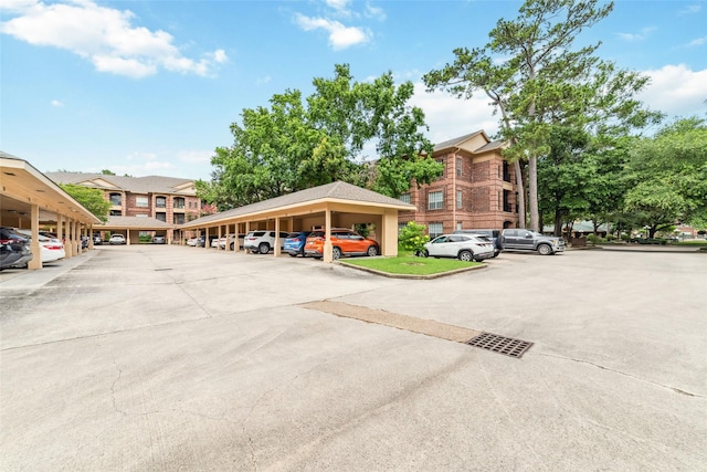 2815 Kings Crossing Dr Unit 106, Houston, TX 77345 - view of partially covered parking lot