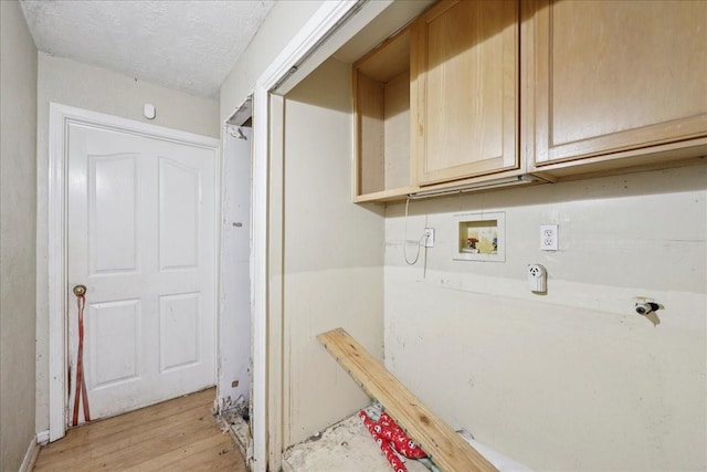 2630 35th St, Pinehurst, TX 77630 - washroom featuring hookup for a washing machine and light wood-style flooring
