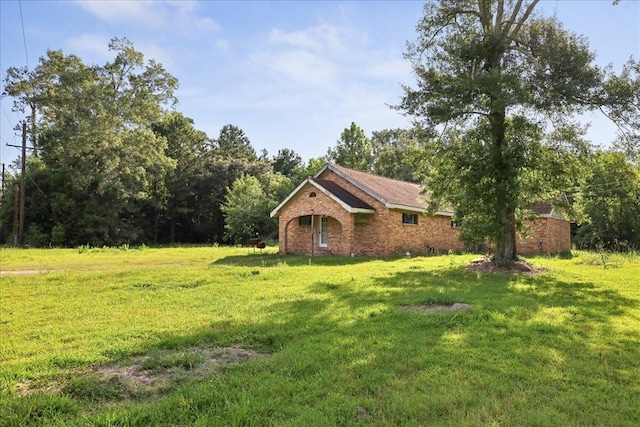 2630 35th St, Pinehurst, TX 77630 - view of green lawn