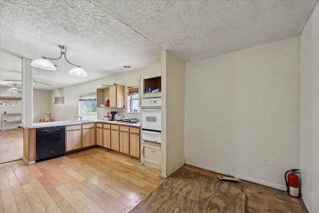 2630 35th St, Pinehurst, TX 77630 - kitchen featuring dishwasher, open shelves, oven, a ceiling fan, and light countertops