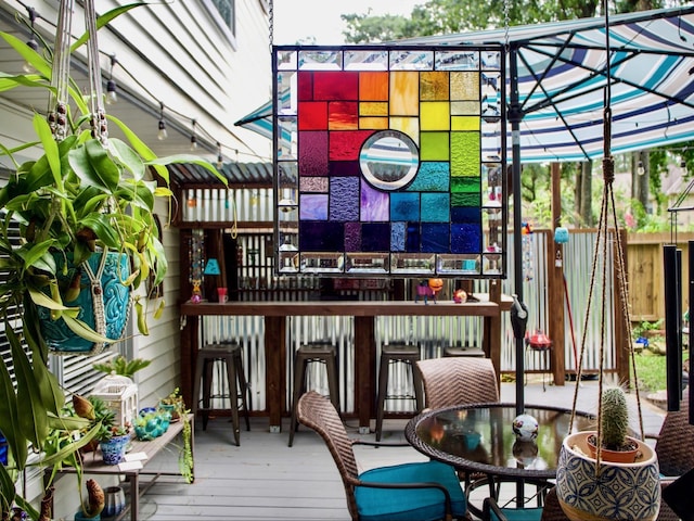 7615 Theisswood Rd, Spring, TX 77379 - wooden terrace featuring outdoor dining space