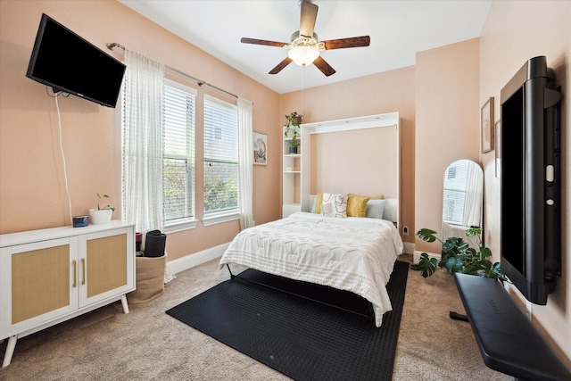 2619 Shady Woods Ln, Houston, TX 77008 - bedroom featuring carpet flooring, baseboards, and a ceiling fan