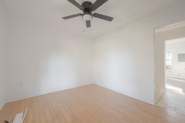 607 Speed St, Wharton, TX 77488 - unfurnished room featuring attic access, wood finished floors, ceiling fan, and cooling unit
