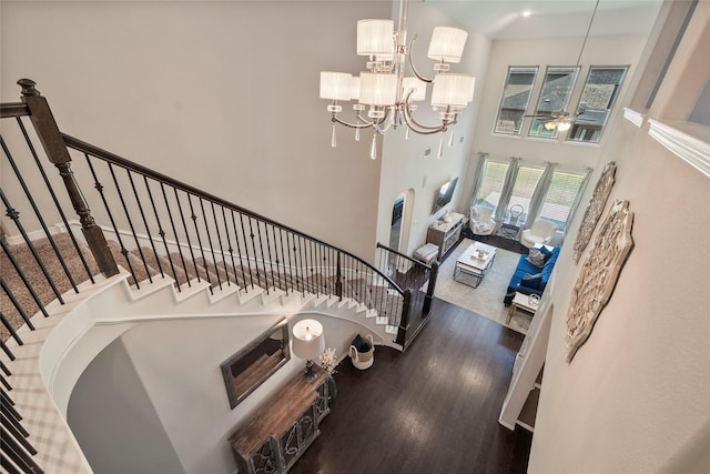 2978 Vintage Park Ln, Pearland, TX 77584 - staircase with a high ceiling, wood finished floors, and a ceiling fan