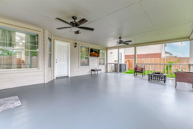 14203 Coveney Dr, Houston, TX 77090 - view of patio / terrace with ceiling fan and a fire pit