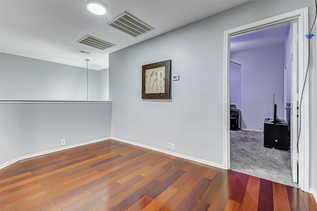 14203 Coveney Dr, Houston, TX 77090 - empty room featuring wood finished floors and baseboards