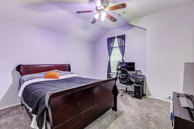 14203 Coveney Dr, Houston, TX 77090 - carpeted bedroom with an office area, a ceiling fan, vaulted ceiling, and baseboards