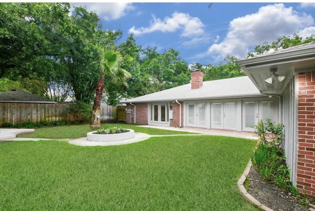 5474 Imogene St, Houston, TX 77096 - view of yard featuring french doors