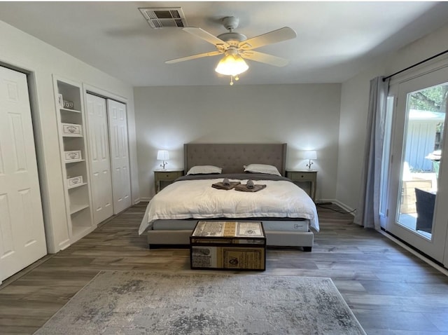 5474 Imogene St, Houston, TX 77096 - bedroom featuring access to exterior, wood finished floors, baseboards, ceiling fan, and multiple closets