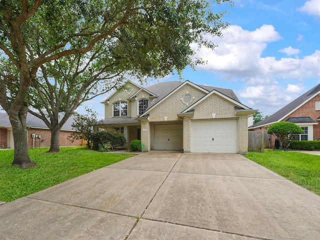 21823 Mystic Point Ct, Katy, TX 77450 - traditional-style home featuring brick siding, concrete driveway, a garage, and a shingled roof