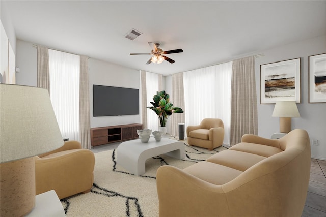 8310 Remington Bluff Ln, Richmond, TX 77407 - living area with a ceiling fan and tile patterned flooring