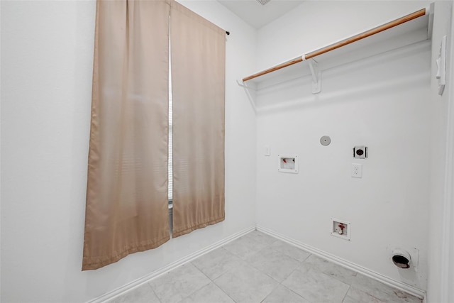 8310 Remington Bluff Ln, Richmond, TX 77407 - laundry area with hookup for a gas dryer, hookup for a washing machine, electric dryer hookup, baseboards, and light tile patterned flooring