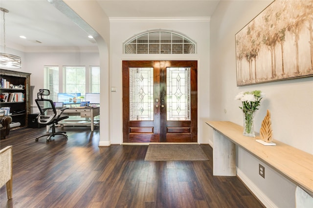 6219 Mound Airy Ct, Sugar Land, TX 77479 - foyer featuring french doors, dark wood finished floors, ornamental molding, arched walkways, and recessed lighting