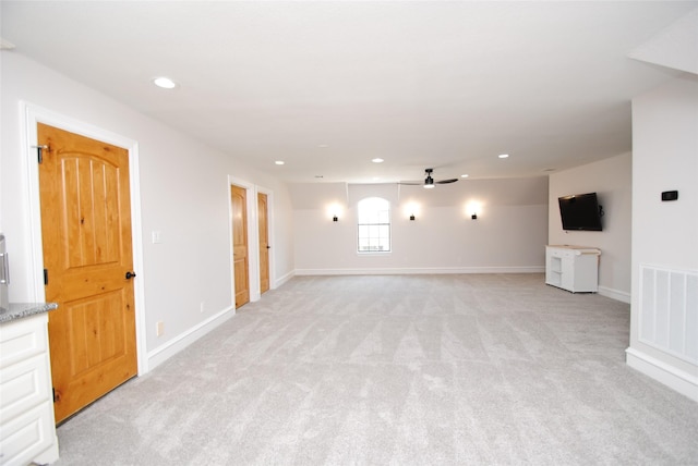 504 High Meadow Ranch Dr, Magnolia, TX 77355 - unfurnished living room with light carpet, recessed lighting, and a ceiling fan