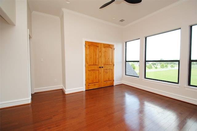 504 High Meadow Ranch Dr, Magnolia, TX 77355 - unfurnished bedroom with wood finished floors, crown molding, and a ceiling fan