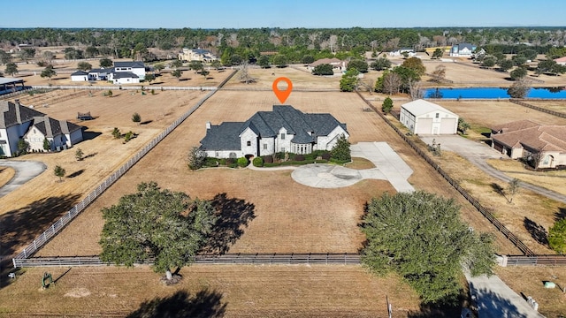 504 High Meadow Ranch Dr, Magnolia, TX 77355 - aerial view of residential area featuring a nearby body of water