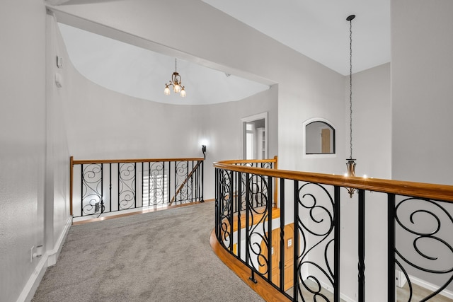 504 High Meadow Ranch Dr, Magnolia, TX 77355 - corridor with an upstairs landing, a chandelier, and carpet flooring