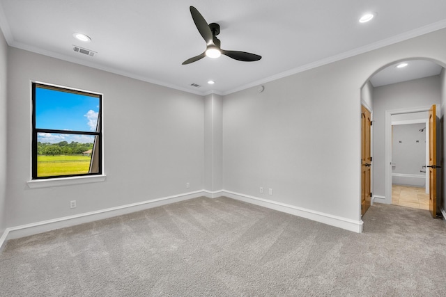504 High Meadow Ranch Dr, Magnolia, TX 77355 - carpeted empty room featuring arched walkways, a ceiling fan, ornamental molding, and recessed lighting