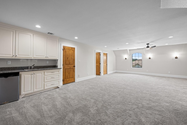 504 High Meadow Ranch Dr, Magnolia, TX 77355 - kitchen with dishwashing machine, recessed lighting, light colored carpet, a ceiling fan, and open floor plan