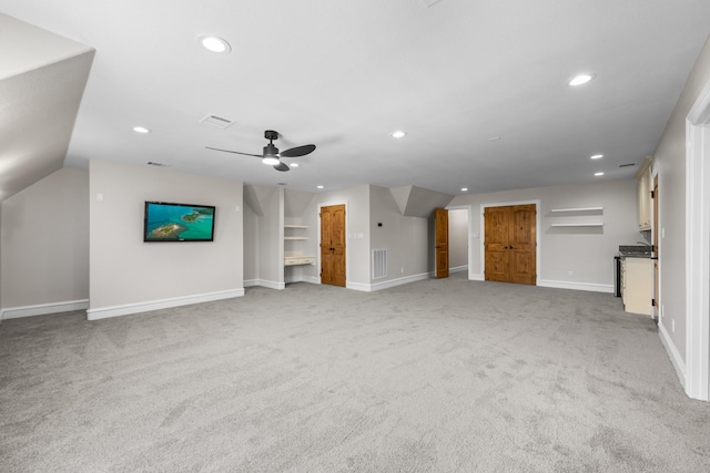 504 High Meadow Ranch Dr, Magnolia, TX 77355 - unfurnished living room featuring light colored carpet, recessed lighting, and a ceiling fan