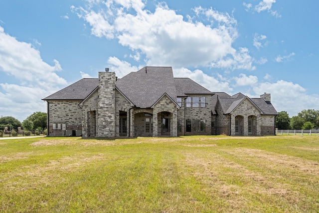 504 High Meadow Ranch Dr, Magnolia, TX 77355 - french provincial home featuring a chimney, a shingled roof, and brick siding