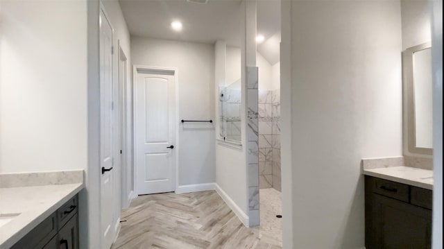 17020 Sweet Iris Ct, Conroe, TX 77302 - bathroom with vanity, a marble finish shower, and baseboards