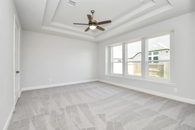20922 Whirlaway Green Cir, Tomball, TX 77377 - carpeted spare room featuring a raised ceiling, ceiling fan, and baseboards