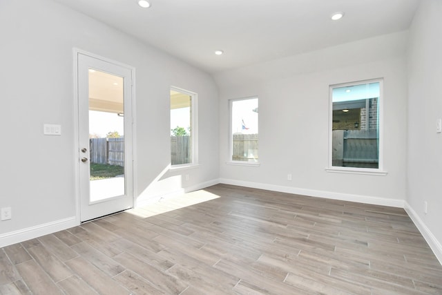 20922 Whirlaway Green Cir, Tomball, TX 77377 - empty room featuring wood finished floors, baseboards, and recessed lighting