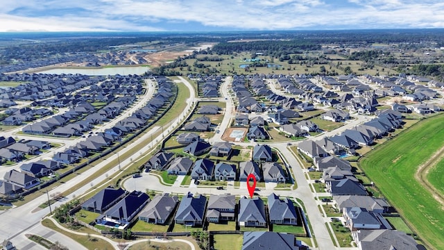 20922 Whirlaway Green Cir, Tomball, TX 77377 - aerial overview of property's location with a large body of water and nearby suburban area