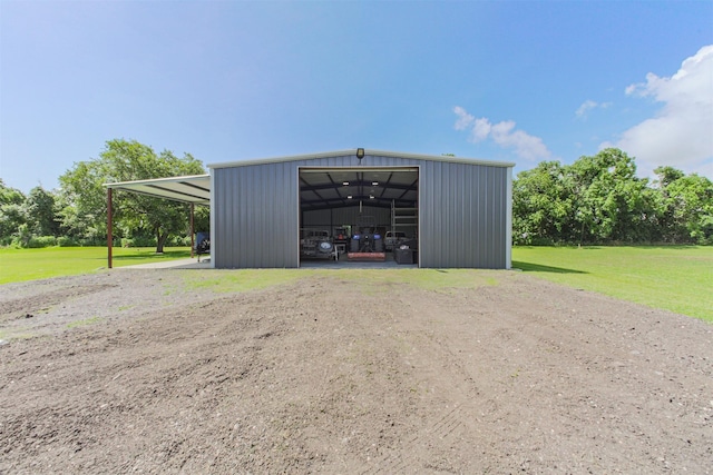 4222 Skylane Rd, Beach City, TX 77523 - view of pole building with a yard and driveway