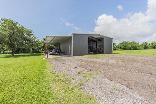 4222 Skylane Rd, Beach City, TX 77523 - view of pole building with a yard and driveway