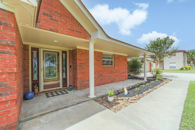 4222 Skylane Rd, Beach City, TX 77523 - doorway to property with brick siding