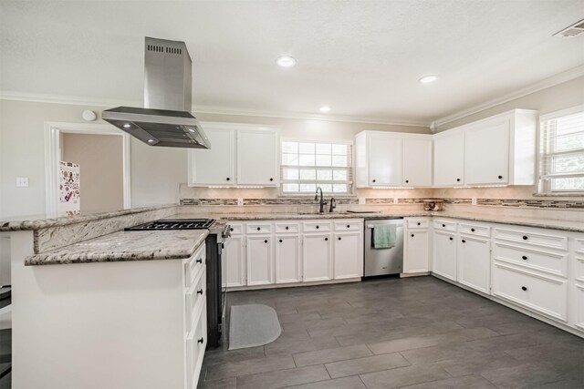 4222 Skylane Rd, Beach City, TX 77523 - kitchen with island exhaust hood, stainless steel dishwasher, black range with gas stovetop, ornamental molding, and plenty of natural light