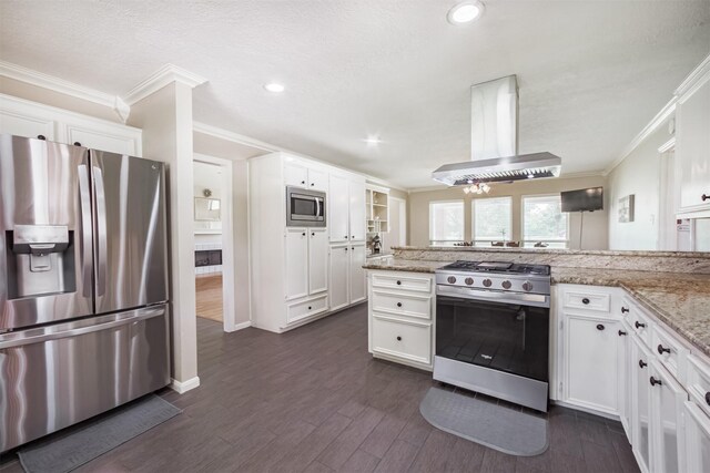 4222 Skylane Rd, Beach City, TX 77523 - kitchen featuring appliances with stainless steel finishes, extractor fan, ornamental molding, dark wood-style floors, and white cabinetry