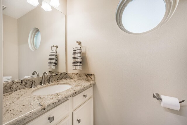 4222 Skylane Rd, Beach City, TX 77523 - half bath featuring vanity and toilet