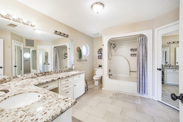 4222 Skylane Rd, Beach City, TX 77523 - full bath with double vanity, shower / tub combo with curtain, toilet, and tile patterned flooring