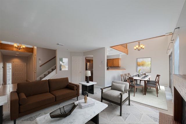 2011 Converse St, Houston, TX 77006 - living area with a chandelier, stairway, and baseboards