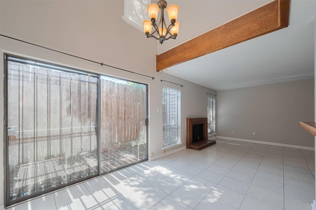 2011 Converse St, Houston, TX 77006 - unfurnished living room with tile patterned flooring, a chandelier, baseboards, a fireplace with raised hearth, and beam ceiling