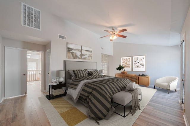 2011 Converse St, Houston, TX 77006 - bedroom with light wood-style flooring, baseboards, vaulted ceiling, and a ceiling fan