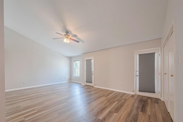 2011 Converse St, Houston, TX 77006 - empty room with ceiling fan, light wood-style floors, and baseboards