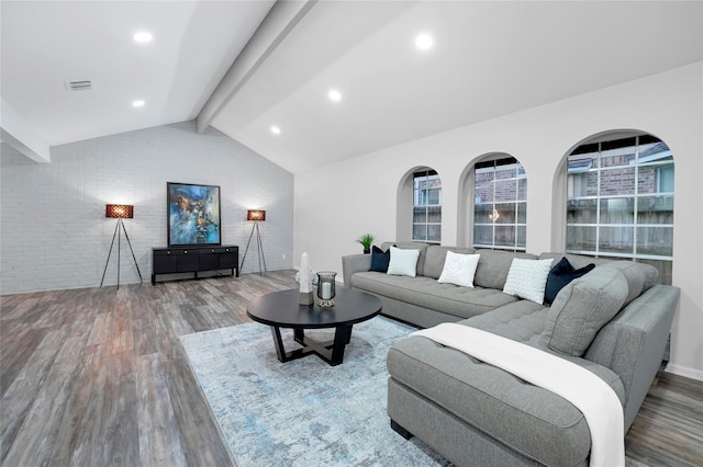5702 Indigo St, Houston, TX 77096 - living room with wood finished floors and brick wall