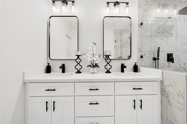 5702 Indigo St, Houston, TX 77096 - bathroom with double vanity and a marble finish shower