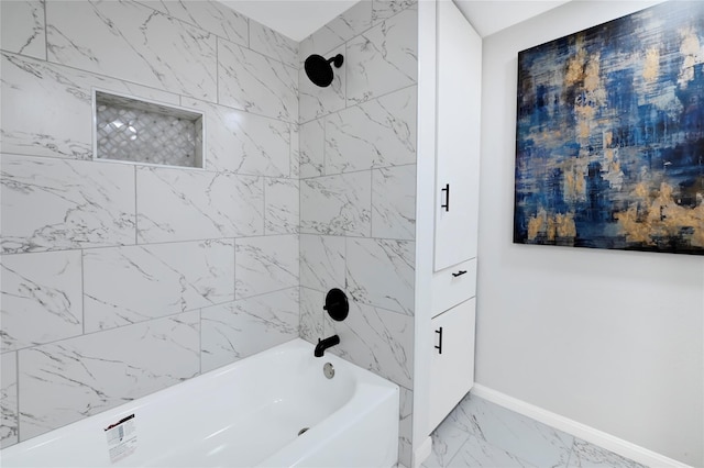 5702 Indigo St, Houston, TX 77096 - bathroom featuring washtub / shower combination and marble finish floors