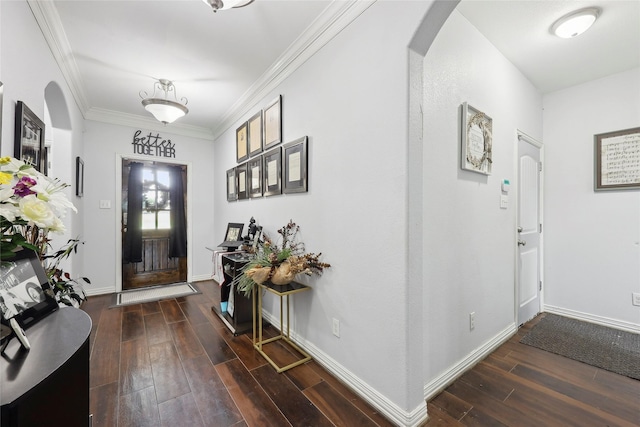 10025 Jason Ct, Beaumont, TX 77705 - entrance foyer featuring arched walkways, wood finished floors, crown molding, and baseboards