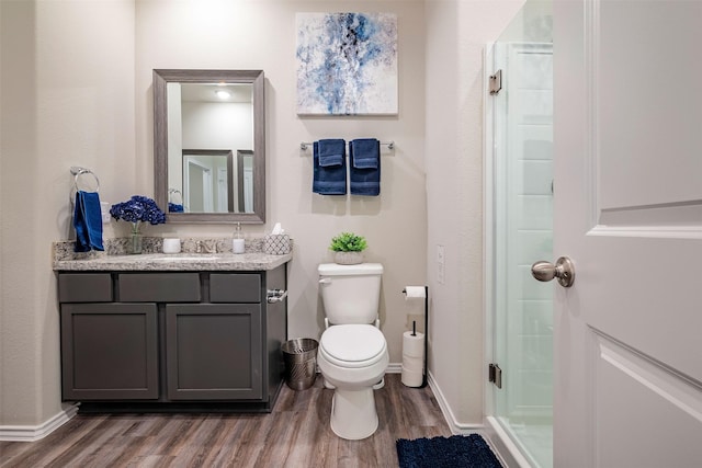 907 Crystal River Rd, Conroe, TX 77316 - bathroom with wood finished floors, vanity, and a shower