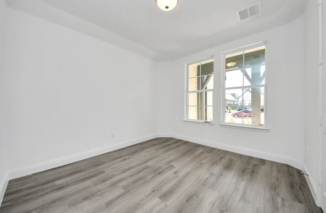 17315 July Moon Ln, Conroe, TX 77302 - unfurnished room with wood finished floors and baseboards