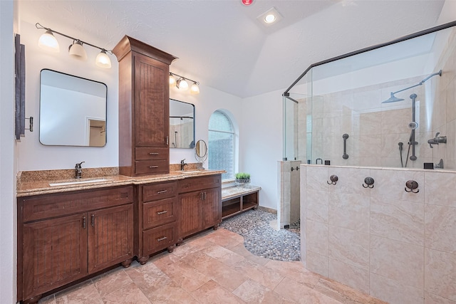 26 Skyland Pl, The Woodlands, TX 77381 - bathroom featuring walk in shower and double vanity